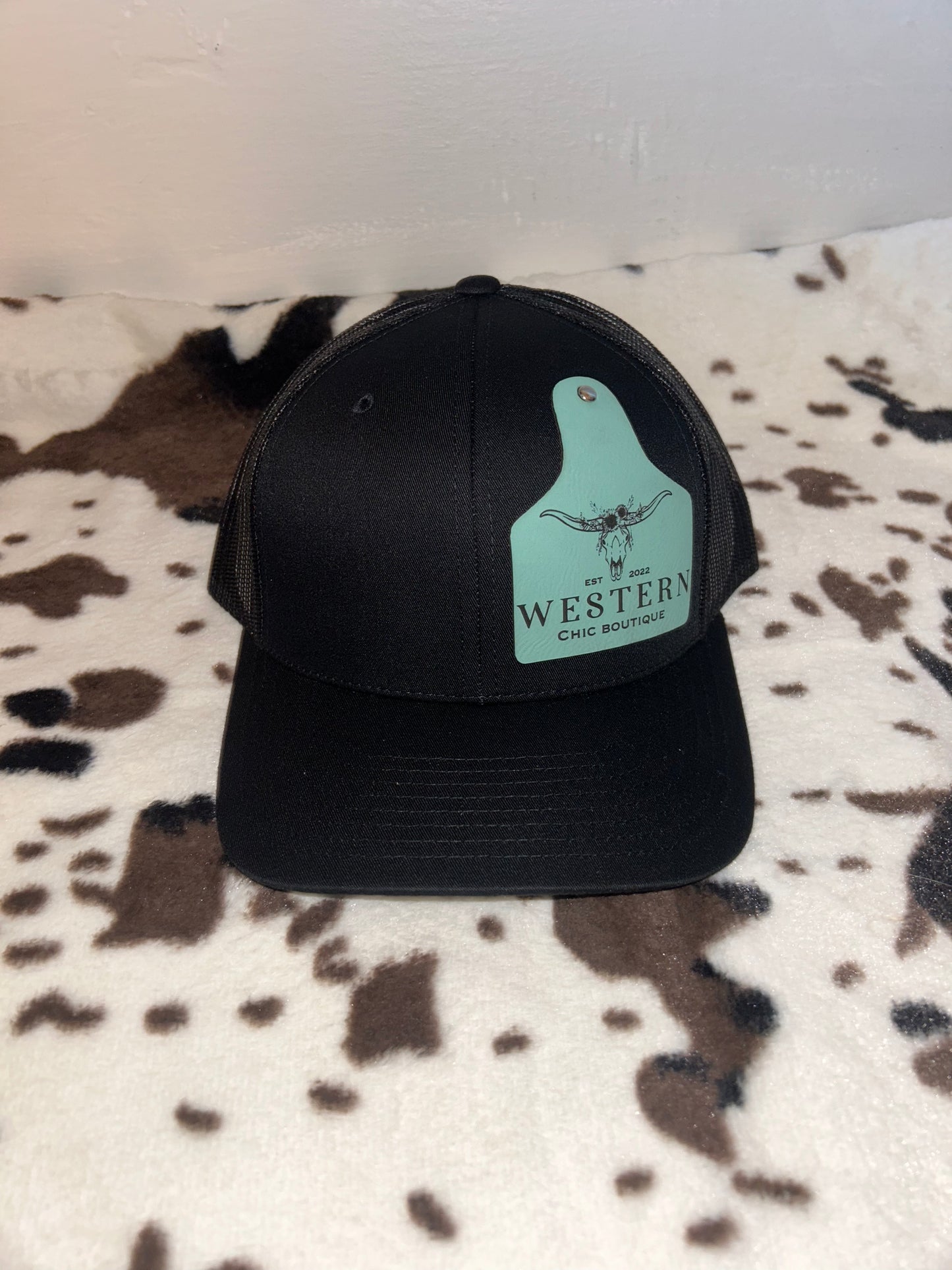 WCB cow tag hats