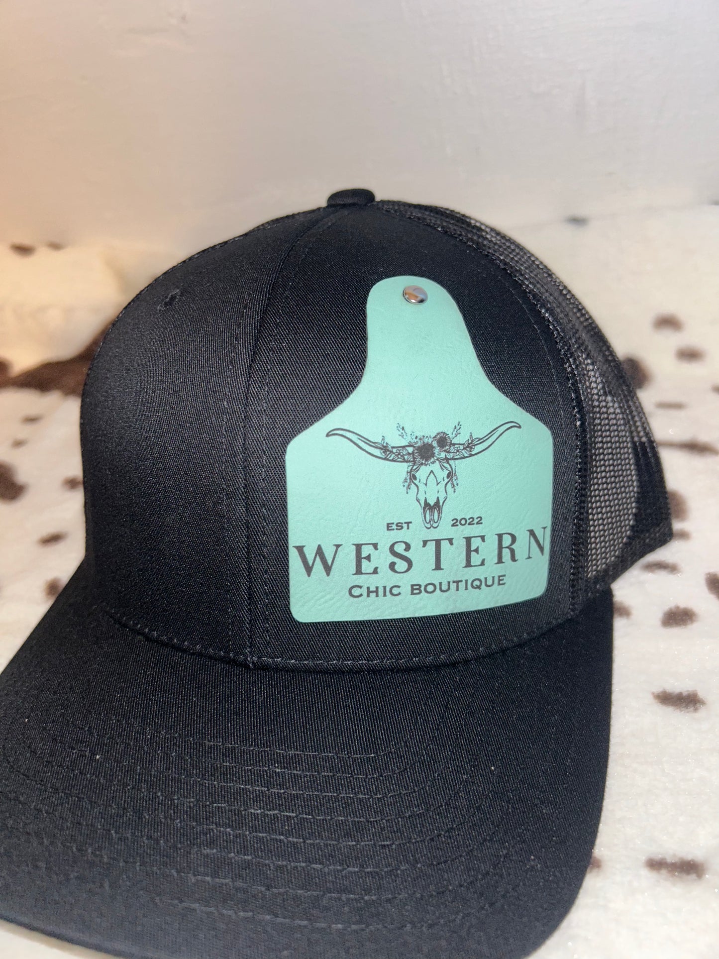 WCB cow tag hats